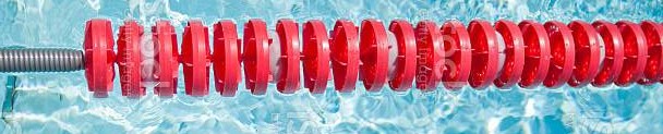 Closeup of red lane rope in swimming pool